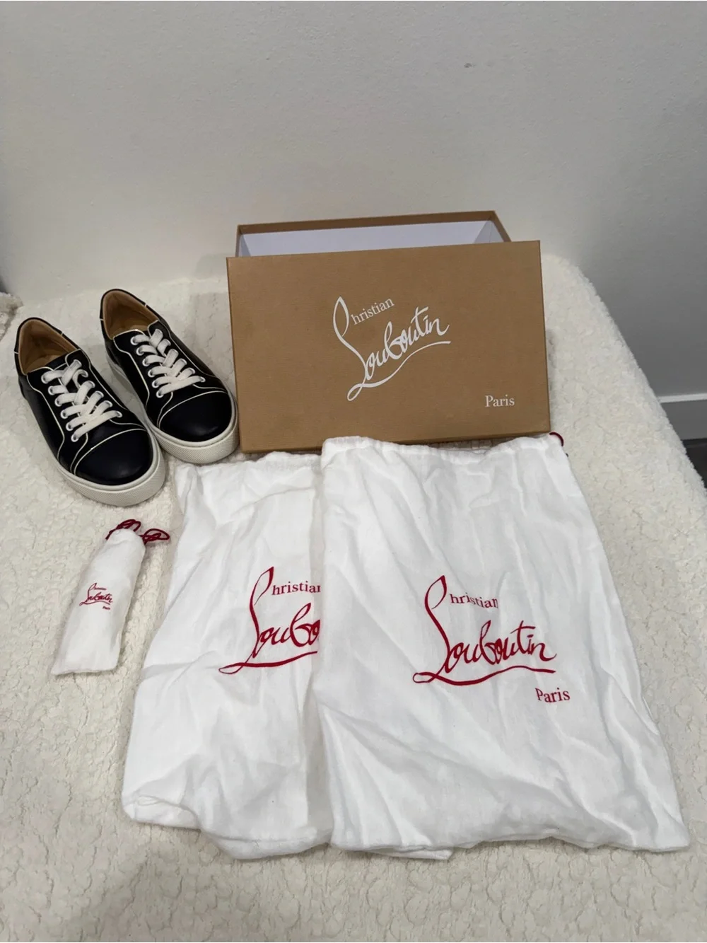 Women’s Christian Louboutin Black and White Low-Top Sneakers with Red Sole